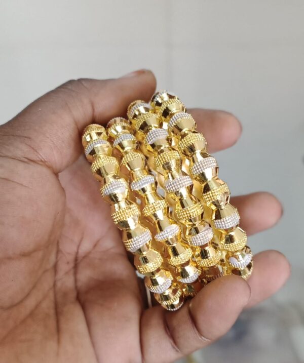 Gold design bangles. - Image 2