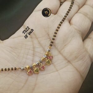 Black beads chain with heart pendant.